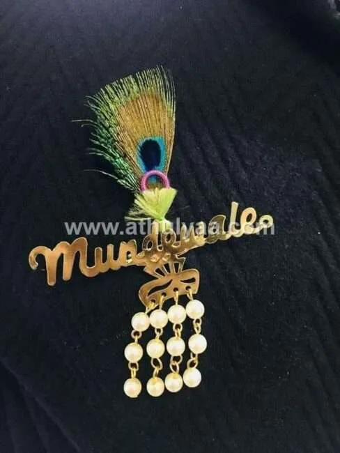 Mundewale brooch with peacock feather Athulyaa