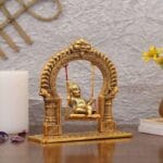 Baby Krishna on jhula statue