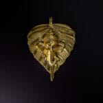 White metal leaf ganesha face gold finish