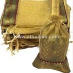 Golden Tissue Potli with Zari